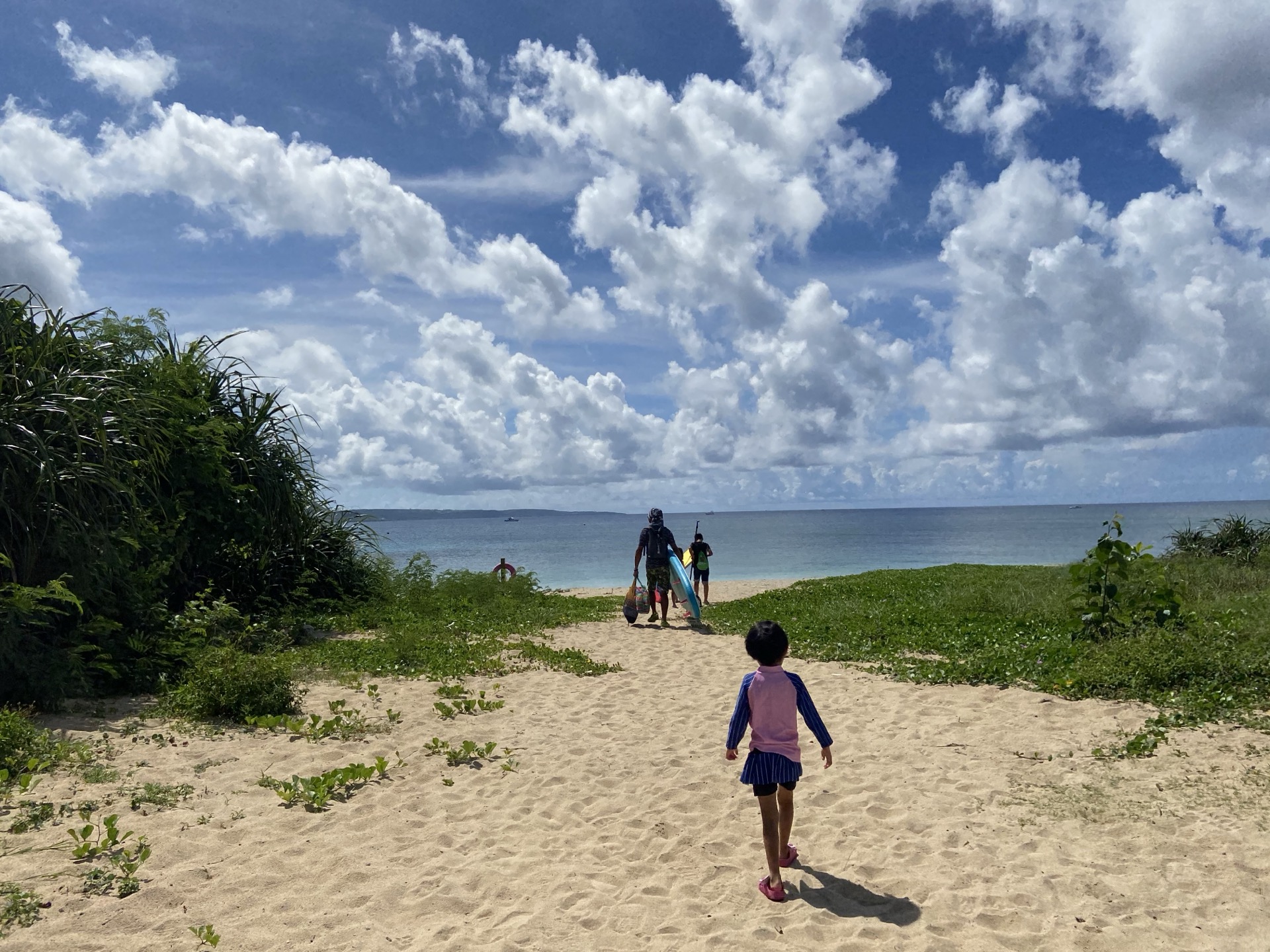 Family heading to the beach
